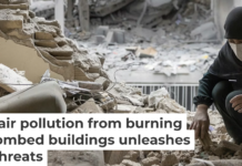 A woman sifts through the rubble in her home after it was damaged by a missile on March 15, 2026, in Tehran. Majid Saeedi/Getty Images
